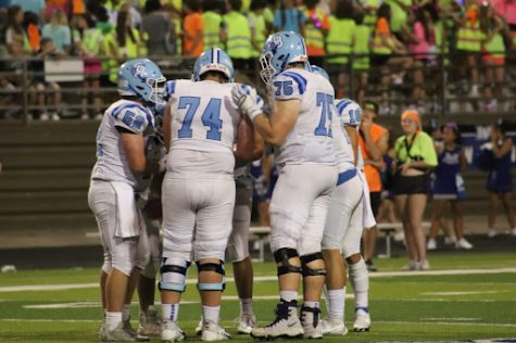 Photo Courtesy of Emily Cain 23:  At Hilliard Davidson, Bears on the field meet in a huddle between plays. The Bears won on the road that night with a final score of 23-14.