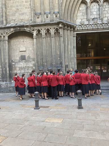 Photo Courtesy of Reese Manley 24: The New World Singers wait to enter a basilica named Santa Maria del Pi in Barcelona, Spain. They performed in front of many locals.
