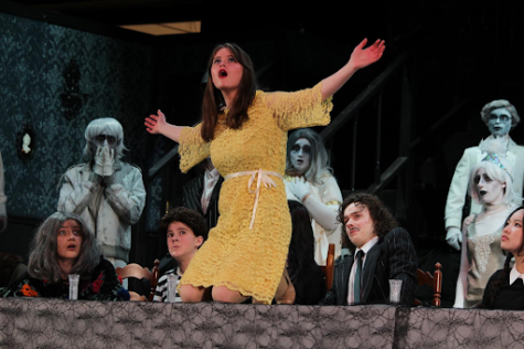 In “Waiting,” Courtney Handshug ‘23 belts out her frustrations as Alice Beineke. The Addams Family was her fourth and final musical with Olentangy Berlin theatre. 
Photo Courtesy: Megan Friece ‘24