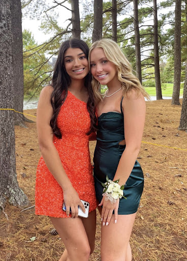 Photo courtesy of Maggie McGreevey 25. At the Lakes Country Club, Maggie McGreevey ‘25 gets together with one of her best friends, Mira Platt ‘25, for a picture before the dance. Later in the night McGreevey and Platt went to dinner at Brio in Polaris and ended up in a thrift store in the mall. 