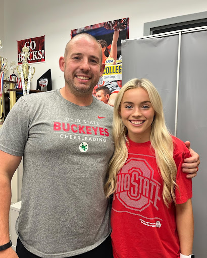 Photo credit: Kristyn Henthorn. Henthorn poses with The Ohio State Universitys head cheer coach Ben Schreiber. She used this picture to first announce her commitment through her instagram.