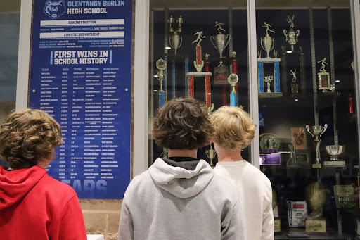 Berlin Takes The Trophies - Sophomores look at Berlins past wins and trophies earned throughout Berlins history. This display is located in the Commons. 
Photo Courtesy of Bex Toth