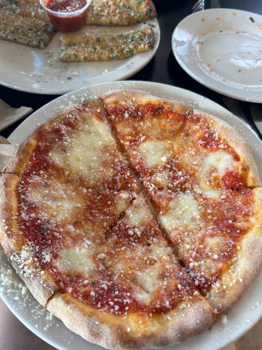 Eat tasty food at Amato’s Woodfired Pizza