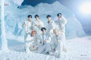 ENHYPEN poses for a photo during their “White Midnight” concept photo shooting day. “This was our first time taking photos on a set where it was snowing like this. I feel like we had fun and did well and I’m happy with the results,” Sunoo said after the shoot. 