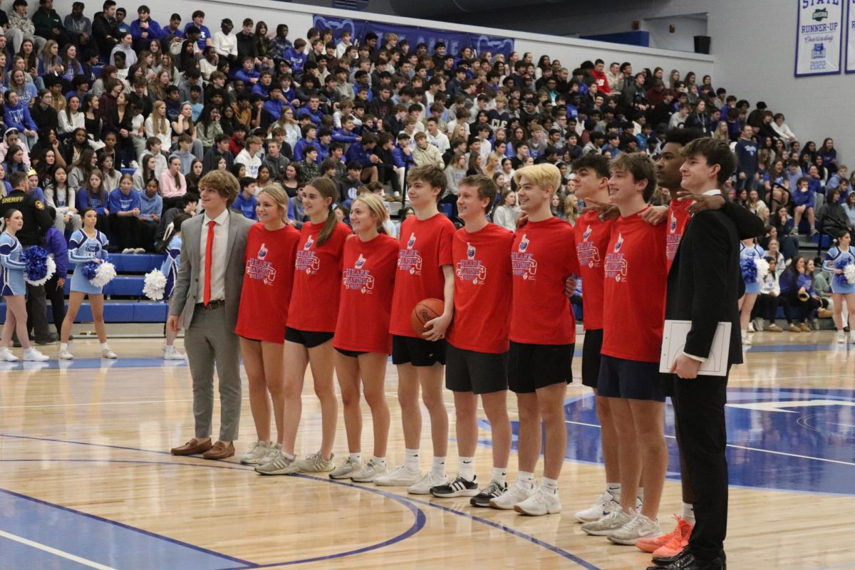 Staff takes down students in Students v.s. Staff basketball game