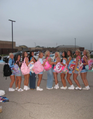 Class of 2026 poses with new backpacks for their first day of school.  The seniors purchased kid backpacks after a trend formed on social media. 