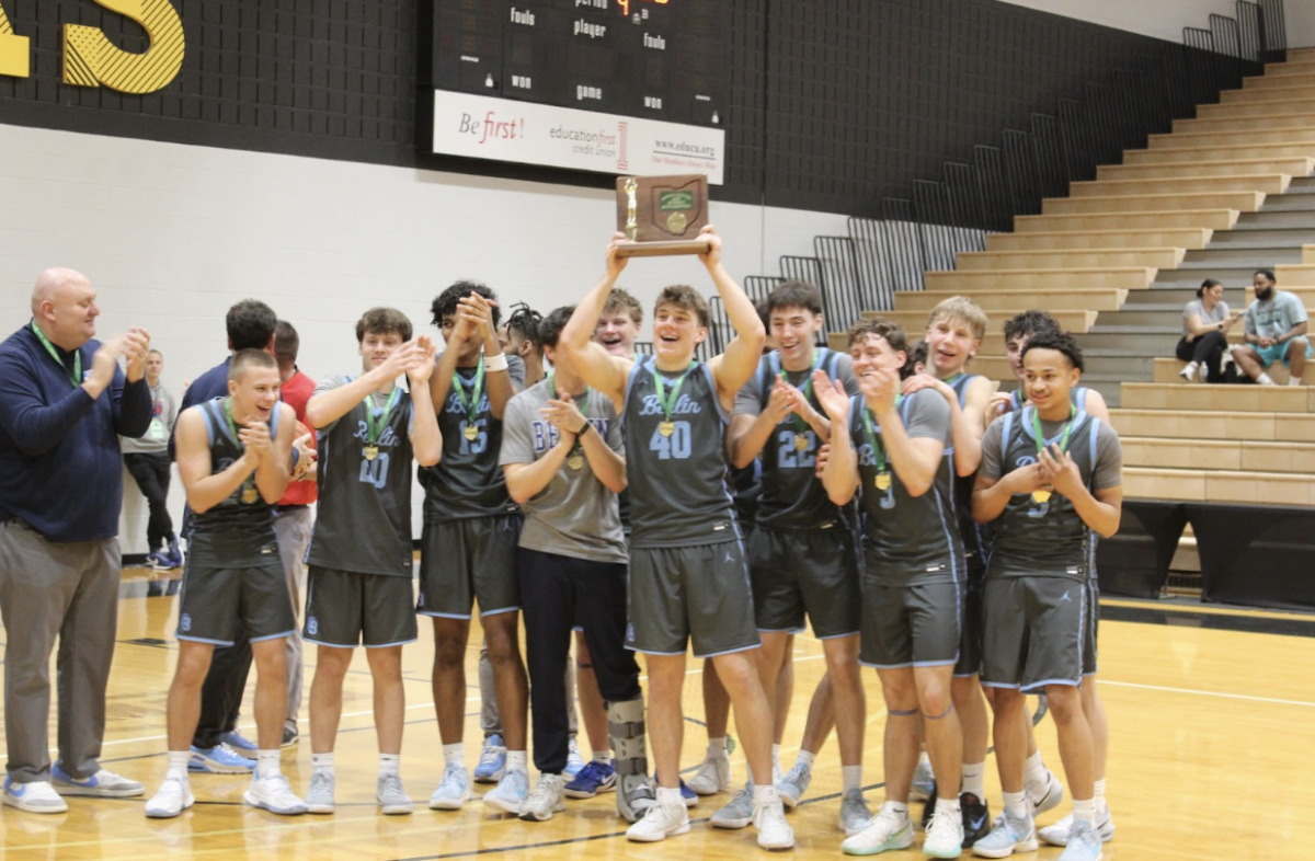 Senior Bryce Rode (‘26) holds up the District Final champions trophy. The Bears defeated Westland High School 60-51 to advance to Regionals.
