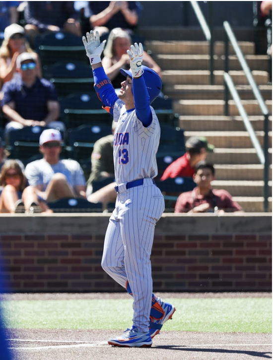 Landon Stripling celebrates his home run against Oklahoma to make the score 9-2. The Gators would go on to win this game 13-2. 
